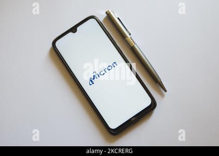 In this photo illustration a Micron logo is display on a smartphone screen and a pencil in Athens, Greece on October 24, 2021. (Photo by Nikolas Kokovlis/NurPhoto) Stock Photo