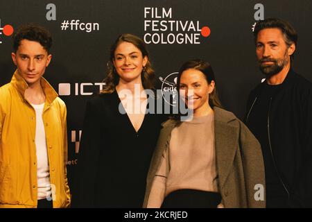 Actor Jonathan Berlin and Benjamin Sadler and Actress Katharina Schüttler and Pauline Renevier attend 'Das Weisse Haus Am Rhein' screen at Cologne film festival in Cologne filmpalast in Cologne, Germany on Oct 26, 2021 (Photo by Ying Tang/NurPhoto) Stock Photo