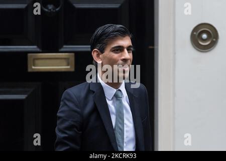 LONDON, UNITED KINGDOM - OCTOBER 27, 2021: Chancellor of the Exchequer Rishi Sunak stands outside 11 Downing Street in central London ahead of the announcement of the Autumn budget and spending review in the House of Commons on October 27, 2021 in London, England. The Chancellor's tax and spending plans in the 2021 Autumn budget are set to be focused on transport, health and education with £5.9bn set for NHS England to cut waiting lists impacted by the Covid-19 pandemic, and pay rises across the public sector. (Photo by WIktor Szymanowicz/NurPhoto) Stock Photo