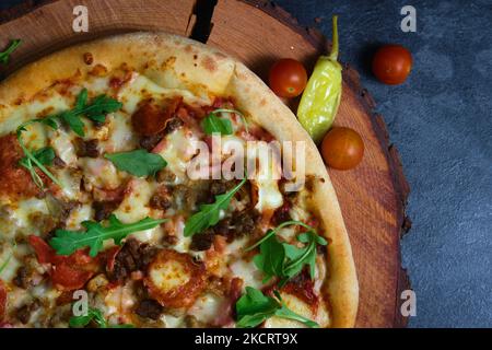 delicious hot pizza on the board Stock Photo