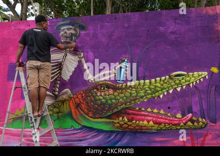 Mexican artist Noise275 working on his new mural as a part of the 'We are all Catrinas 2021' (Todas somos Catrinas 2021) festival inspired by the Day of the Dead (Día de Muertos), in the center of Playa Del Carmen. On Saturday, 30 October 2021, in Playa Del Carmen, Quintana Roo, Mexico. (Photo by Artur Widak/NurPhoto) Stock Photo
