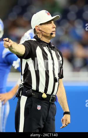 Referee Tony Corrente, left, watches a replay in the first half of