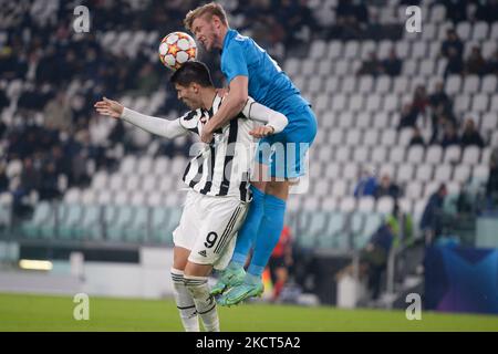 Alvaro Morata of Juventus FC and Dmitri Chistyakov of Zenit during the UEFA Champions League group H match between Juventus and Zenit St. Petersburg at on November 2, 2021 in Turin, Italy (Photo by Alberto Gandolfo/NurPhoto) Stock Photo