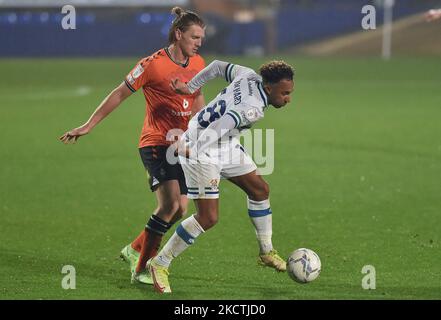 Oldham Athletic's Carl Piergianni tussles with Nicky Maynard of Tranmere Rovers during the EFL Trophy match between Tranmere Rovers and Oldham Athletic at Prenton Park, Birkenhead on Tuesday 9th November 2021. (Photo by Eddie Garvey/MI News/NurPhoto) Stock Photo