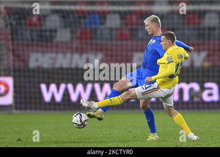 Andri Gudjohnsen and Nicusor Bancu in action during the FIFA World Cup Qatar 2022 qualification Group J football match Romania v Iceland, in Bucharest on November 11, 2021. (Photo by Alex Nicodim/NurPhoto) Stock Photo