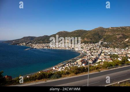 Panoramic view of Samos town, a natural sea harbor, the port town and capital of Samos Island and regional unit known also as Vathy, the old name. Samos town was built in the middle of the 18th century as the port of Vathy and has a population of 8100 residents. In ancient times, Samos was an especially rich and powerful city-state, known for its vineyards and wine production while nowadays the Samian economy relies on agriculture and tourist industry. Samos is the birthplace of the Greek philosopher and mathematician Pythagoras. Samos Island, Greece on September 21, 2021 (Photo by Nicolas Eco Stock Photo