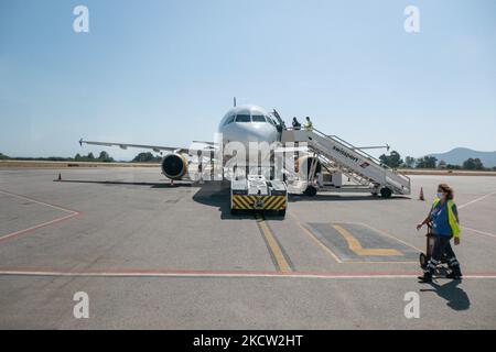 Condor Airbus A320 aircraft at Samos International Airport SMI Aristarchos. The Airbus A320-200 has the registration D-AICI and the logo CONDOR printed on the side of the fuselage. Condor or Condor Flugdienst GmbH is a German charter and scheduled airline flying to Samos Island seasonal from Düsseldorf, Frankfurt, Hamburg and Munich in Germany as Samos Island in the Aegean Sea is a popular summer destination for tourists. Samos Island, Greece on September 21, 2021 (Photo by Nicolas Economou/NurPhoto) Stock Photo