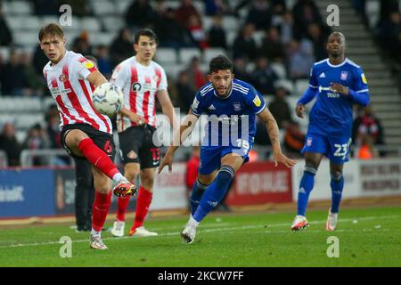 Sunderland's Callum Doyle passes a ball back to the goalkeeper during the Sky Bet League 1 match between Sunderland and Ipswich Town at the Stadium Of Light, Sunderland on Saturday 20th November 2021. (Photo by Michael Driver/MI News/NurPhoto) Stock Photo