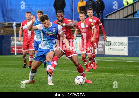 Ludwig Francillette of Crawley Town FC tackles Matthew Platt of Barrow FC during the Sky Bet League 2 match between Barrow and Crawley Town at Holker Street, Barrow-in-Furness on Saturday 20th November 2021. (Photo by Ian Charles/MI News/NurPhoto) Stock Photo