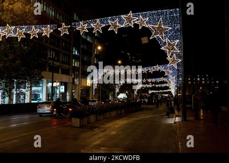A road with Christmas decorations at the center of Athens, Greece on November 22, 2021. (Photo by Nikolas Kokovlis/NurPhoto) Stock Photo