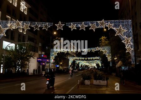 A road with Christmas decorations at the center of Athens, Greece on November 22, 2021. (Photo by Nikolas Kokovlis/NurPhoto) Stock Photo