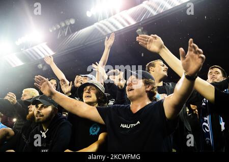 Sydney FC fans celebrate winning the FFA Cup round of 32 match between Sydney Olympic FC and Sydney FC at Belmore Sports Ground on November 24, 2021 in Sydney, Australia. (Editorial use only) Stock Photo