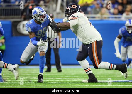 A Chicago Bears fan holds a quarterback Justin Fields jersey before an NFL  football game against the Houston Texans Sunday, Sept. 25, 2022, in Chicago.  (AP Photo/Nam Y. Huh Stock Photo - Alamy