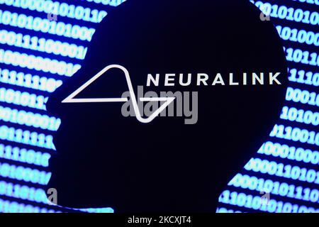 Neuralink logo displayed on a phone screen, a silhouette of a paper in shape of a human face and a binary code displayed on a screen are seen in this multiple exposure illustration photo taken in Krakow, Poland on December 10, 2021. (Photo by Jakub Porzycki/NurPhoto) Stock Photo