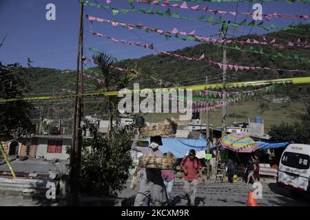 Panoramic view of the square of the Monumental Virgen de Guadalupe located in the Sierra Norte de Xicotepec de Juárez Puebla, Mexico, on the occasion of the celebration of the Day of the Virgin of Guadalupe in the country. The Monumental Virgin of Guadalupe was created in 2006, and according to the faith, she appeared on stones in the village called El Tabacal. Surrounded by a small square made to contemplate her, the virgin of the green mantle with her 23 metres high forces the visitor to hold her head high. (Photo by Gerardo Vieyra/NurPhoto) Stock Photo