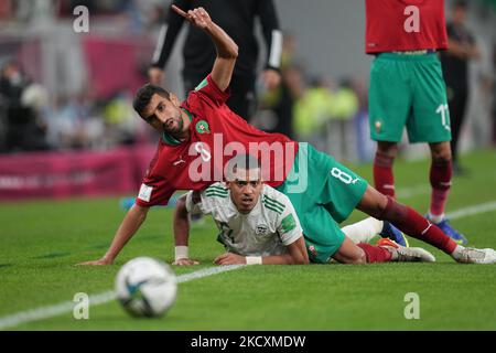 (8) EL KARTI Walid of Morocco team battles for possession with (14) BENDEBKA Sofiane of Algeria team during the FIFA Arab Cup Qatar 2021 Quarter-Final match between Morocco and Algeria at Al Thumana Stadium on December 11, 2021 in Doha, Qatar. (Photo by Ayman Aref/NurPhoto) Stock Photo