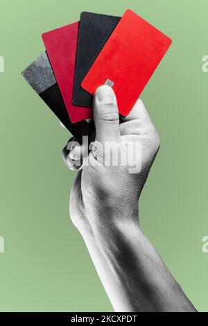 Man's hand holding credit cards. Stock Photo