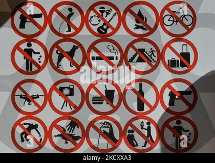 A set of forbidden signs at the entrance to Kabah Maya archaeological site. On Thursday, December 02, 2021, in Kebah, Yucatan, Mexico. (Photo by Artur Widak/NurPhoto) Stock Photo