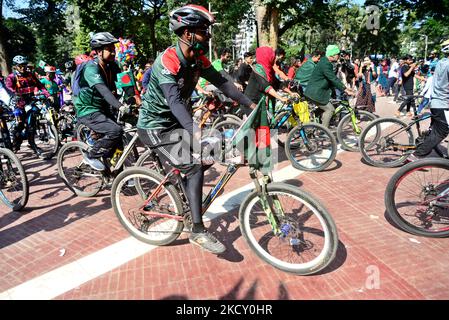 Bangladeshi cyclists join the cycle rally during the celebrations of the 50th anniversary of Victory Day in Dhaka, Bangladesh, December 16, 2021. On 16 December 1971, Bangladesh became an independent country, under the leadership of Sheikh Mujibur Rahman, after a victory in the War of Liberation against Pakistani (Photo by Mamunur Rashid/NurPhoto) Stock Photo