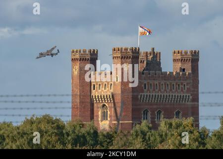 Coningsby United Kingdom October Oct 01, 2022: RAF Battle of Britain Memorial Flight Lancaster passes Tattersall Castle, Lincolnshire United Kingdom Stock Photo