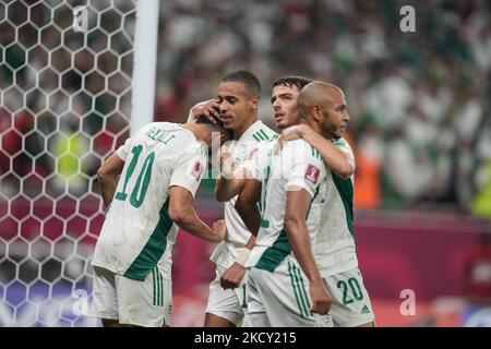 Action Algeria team after (6) AKRAM AFIF of Qatar obstruction (11) BENLAMRI Djamel of Algeria team which led to the penalty kickin the final seconds of the match at the FIFA Arab Cup Qatar 2021 Semi-Final match between Qatar and Algeria at the FIFA Arab Cup Qatar 2021 Semi-Final match between Qatar and Algeria at Al Thumana Stadium on December 15, 2021 in Doha, Qatar. (Photo by Ayman Aref/NurPhoto) Stock Photo