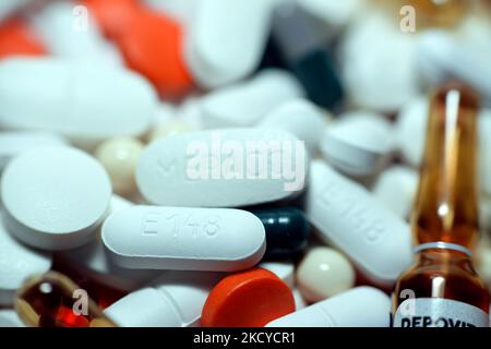 Cairo, Egypt, October 29 2022: pile of different medical tablets, pills, capsules and ampules that used to treat various diseases and conditions, stac Stock Photo