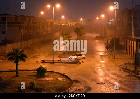 Cairo, Egypt, October 25 2022: foggy unclear scene of the streets due to heavy rains flooding with stormy wind, thunder and lightning in Cairo, Egypt, Stock Photo