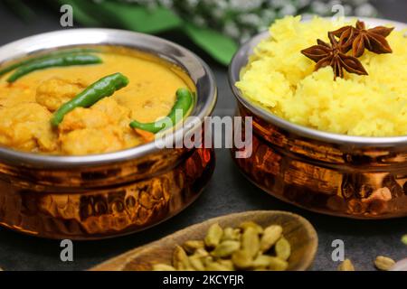 Goan style prawn curry with saffron spiced rice in Toronto, Ontario, Canada, on December 26, 2021. These dishes hail from Goa, India and are rich in flavors and spices. (Photo by Creative Touch Imaging Ltd./NurPhoto) Stock Photo