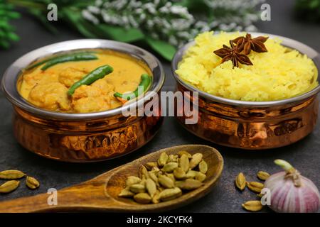 Goan style prawn curry with saffron spiced rice in Toronto, Ontario, Canada, on December 26, 2021. These dishes hail from Goa, India and are rich in flavors and spices. (Photo by Creative Touch Imaging Ltd./NurPhoto) Stock Photo