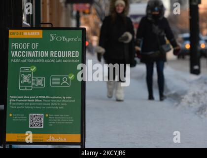 Proof of Vaccination Required sign outside O'Byrne's Irish Pub in Edmonton. On Thursday, December 30, 2021, in Edmonton, Alberta, Canada. (Photo by Artur Widak/NurPhoto) Stock Photo