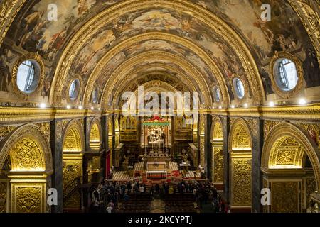 Tourists visit the St. John's Co-Cathedral in Valletta, Malta on November 25, 2019. (Photo by Emmanuele Contini/NurPhoto) Stock Photo