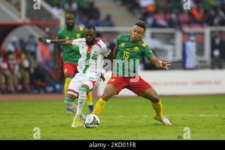 Blati Touré of Burkina Faso and Pierre Kunde of Cameroon during Cameroon against Burkina Faso, African Cup of Nations, at Paul Biya Stadium on January 9, 2022. (Photo by Ulrik Pedersen/NurPhoto) Stock Photo