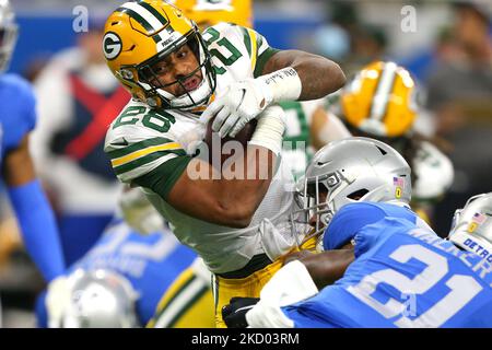 January 02, 2022: Green Bay Packers running back A.J. Dillon #28 celebrates  scoring a touchdown during NFL football game between the Minnesota Vikings  and the Green Bay Packers at Lambeau Field in