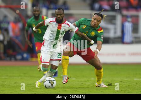 Blati Touré of Burkina Faso and Pierre Kunde of Cameroon during Cameroon against Burkina Faso, African Cup of Nations, at Paul Biya Stadium on January 9, 2022. (Photo by Ulrik Pedersen/NurPhoto) Stock Photo