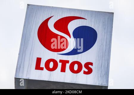 LOTOS logo is seen at LOTOS petrol station in Krakow, Poland on January 12, 2022. Poland's largest refiner PKN Orlen will sell some Lotos assets to companies including Saudi Aramco and Hungary's MOL to fulfil EU antitrust rulings and complete its takeover of the smaller firm. (Photo by Beata Zawrzel/NurPhoto) Stock Photo