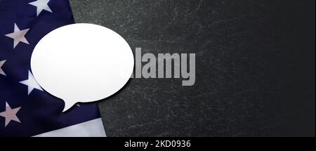 The flag of United States of America and  speech bubble, panoramic layout Stock Photo