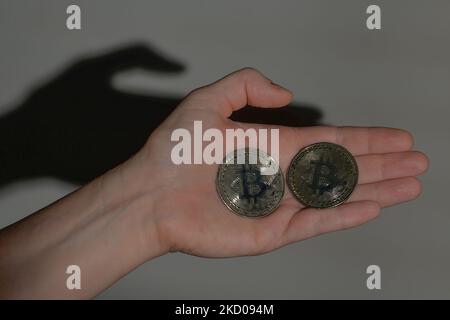 Illustrative image of two commemorative bitcoins. On Wednesday, January 12, 2021, in Edmonton, Alberta, Canada. (Photo by Artur Widak/NurPhoto) Stock Photo