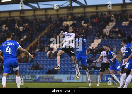 James Jones of Barrow contests a header with Brendan Sarpong-Wiredu of Colchester during the Sky Bet League 2 match between Colchester United and Barrow at the JobServe Community Stadium, Colchester on Saturday 15th January 2022. (Photo by Ivan Yordanov/MI News/NurPhoto) Stock Photo