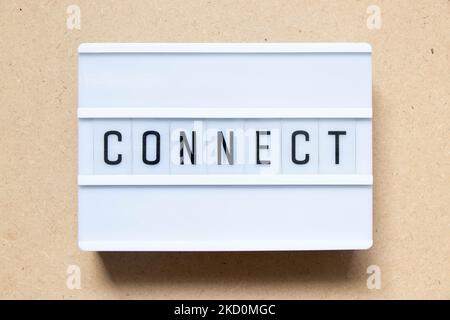 Lightbox with word connect on wood background Stock Photo