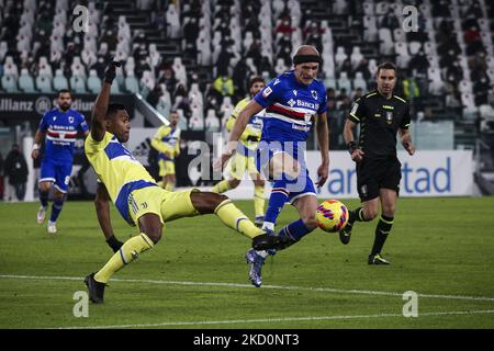 Juventus defender Alex Sandro (12) tackles Sampdoria midfielder Morten Thorsby (2) during the Coppa Italia round of 16 football match JUVENTUS - SAMPDORIA on January 18, 2022 at the Allianz Stadium in Turin, Piedmont, Italy. (Photo by Matteo Bottanelli/NurPhoto) Stock Photo