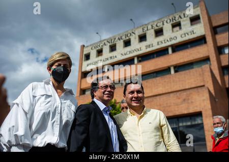 Veronica Alcocer (L) walks with his husband and Presidential Candidate Gustavo Petro (C) and senator a supporter after registering his candidacy at the National Registry of Civil Status (Registraduria Nacional del Estado Civil) in Bogota, Colombia on January 20, 2022. (Photo by Sebastian Barros/NurPhoto) Stock Photo