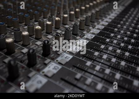 Used old dusty Music Studio Dials, Knobs, Switches and Sliders Stock Photo