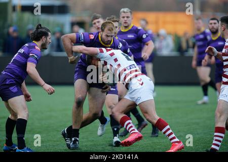 NEWCASTLE UPON TYNE, UK. JAN 23RD Ted Chapelhow of Newcastle Thunder tackles Morgan Smithies of Wigan Warriors during the Friendly match between Newcastle Thunder and Wigan Warriors at Kingston Park, Newcastle on Saturday 22nd January 2022. (Photo by Chris Lishman/MI News/NurPhoto) Stock Photo