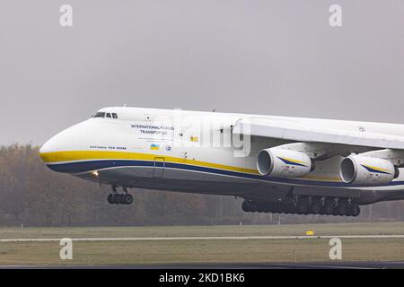 The Antonov An-124 Ruslan is a large, strategic airlift, four-engined aircraft that was designed in the 1980s by the Antonov design bureau in the Ukrainian SSR, the largest military transport aircraft in service. The An-124 is the world's heaviest gross weight production cargo airplane. Cargo flights have increased demand and fly more as the passenger aviation industry traffic is phasing a difficult period with the Covid-19 coronavirus pandemic having a negative impact on the travel business industry with fears of the worsening situation due to the new Omega variant mutation. Eindhoven, The Ne Stock Photo