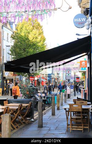 Cobbled Bold Street in the Ropewalks area of central Liverpool, now full of independent shops, trendy cafes and multicultural restaurants, in autumn sunshine, UK Stock Photo