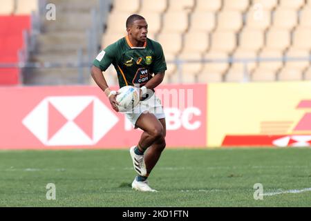 Shaun Williams of South Africa runs with the ball during the Men's HSBC ...