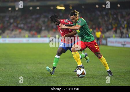 Ebrima Darboe of Gambia and Pierre Kunde of Cameroon during Cameroon versus The Gambia, African Cup of Nations, at Japoma Stadium on January 29, 2022. (Photo by Ulrik Pedersen/NurPhoto) Stock Photo