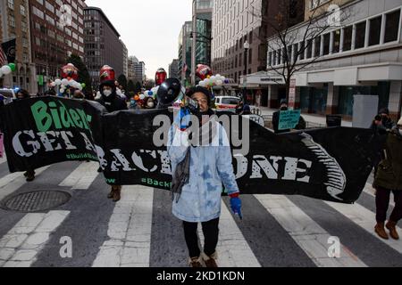 Kevin Cramer Jr., co-founder of activist organization The Palm Collective, leads a march to the offices of lobbying firm No Labels in downtown Washington, D.C. on January 31, 2022, as part of a demonstration demanding passage of the Build Back Better Act (Photo by Bryan Olin Dozier/NurPhoto) Stock Photo
