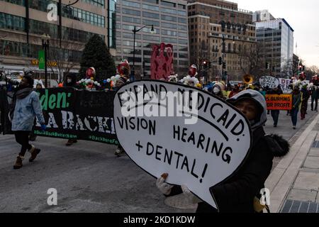 Demonstrators march to the offices of lobbying firm No Labels in downtown Washington, D.C. on January 31, 2022, as part of a demonstration demanding passage of the Build Back Better Act (Photo by Bryan Olin Dozier/NurPhoto) Stock Photo
