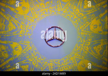 The icon badge of a Mercedez Benz car is seen in an art display during the MCM Show 2022 auto show in Corferias in Bogota, Colombia on January 28 and 29 2022. (Photo by Sebastian Barros/NurPhoto) Stock Photo